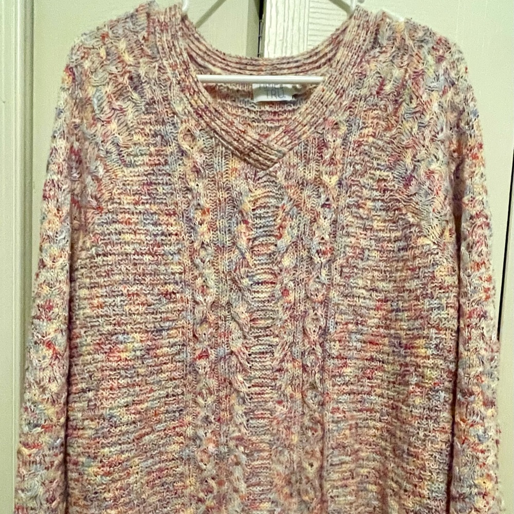 Is comfy Sweater is very soft and very comfortable. It is like new